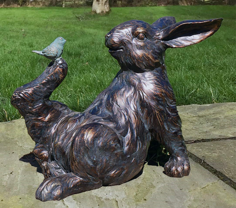 Bronze effect Rabbit with a Bird on his Foot figurine, quirky home or garden decoration