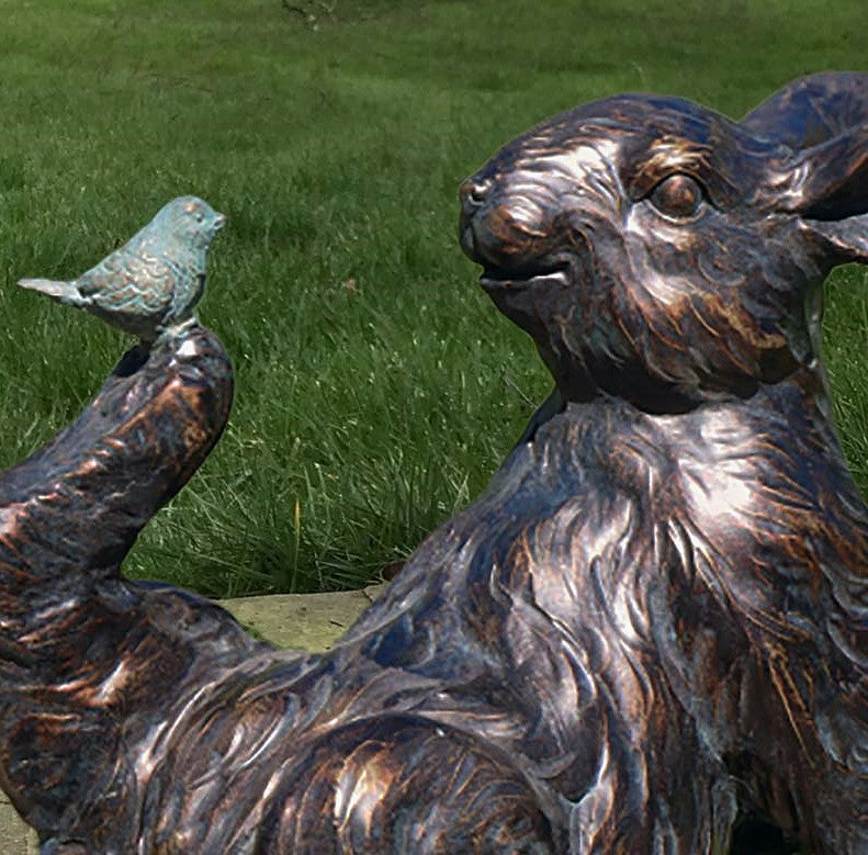 Bronze effect Rabbit with a Bird on his Foot figurine, quirky home or garden decoration